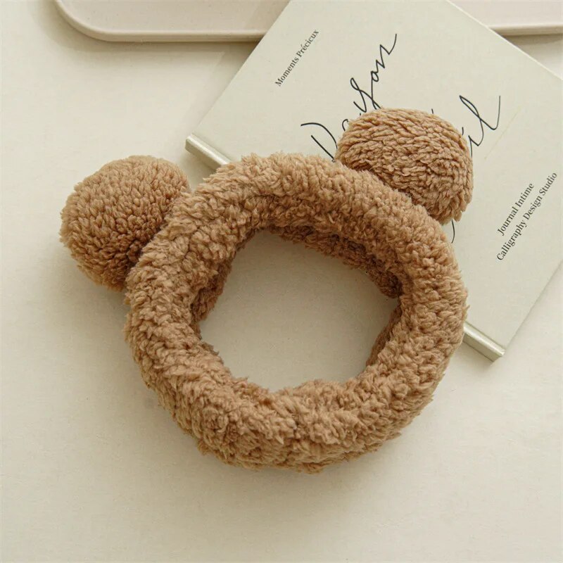 light brown headband with rounded ears